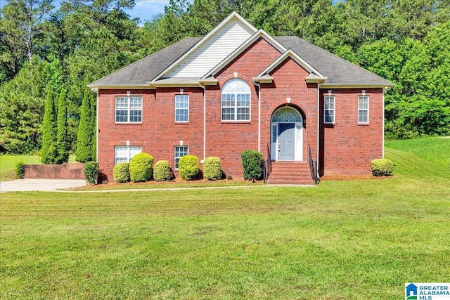 555 Ridgefield Way, Odenville, AL 35120 - view of front of house with a front yard and brick siding