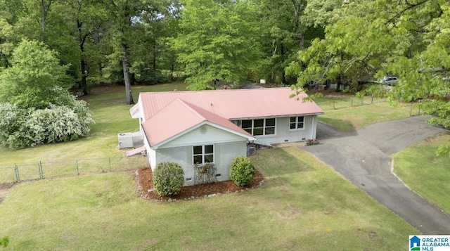 4010 93rd St, Northport, AL 35473 - view of front of house featuring metal roof, crawl space, and driveway