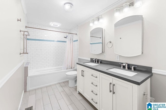4010 93rd St, Northport, AL 35473 - full bath with double vanity, shower / bathtub combination with curtain, toilet, and ornamental molding