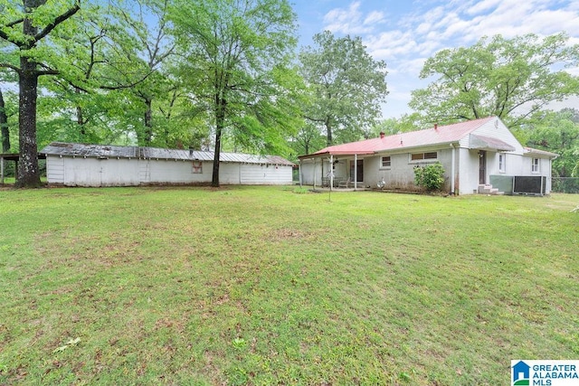 4010 93rd St, Northport, AL 35473 - view of yard featuring a sunroom