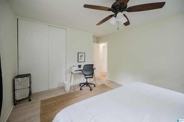 1320 Monticello St, Irondale, AL 35210 - bedroom with light wood finished floors, a closet, ceiling fan, and baseboards