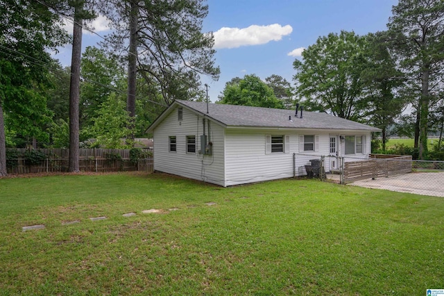 1320 Monticello St, Irondale, AL 35210 - rear view of house with a gate and a patio