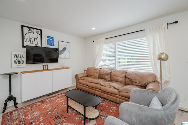 1320 Monticello St, Irondale, AL 35210 - living room featuring recessed lighting, baseboards, and wood finished floors
