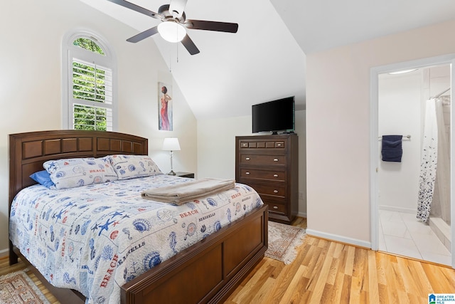 919 Sycamore Dr, Hoover, AL 35244 - bedroom with lofted ceiling, light wood-style flooring, a ceiling fan, and baseboards