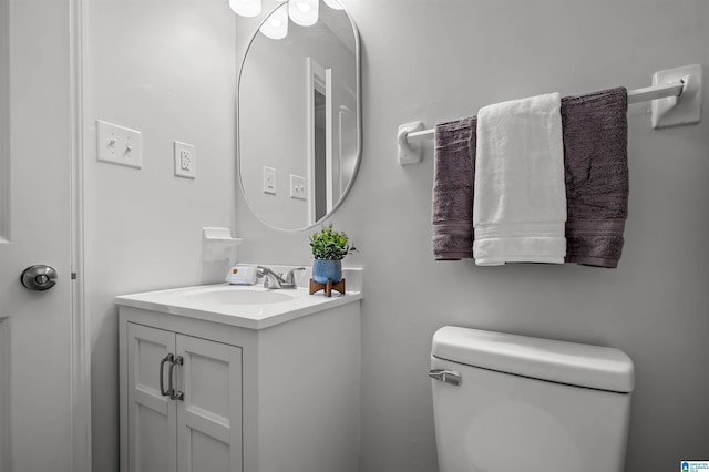 941 Honeysuckle Ln, Moody, AL 35094 - half bathroom with vanity and toilet