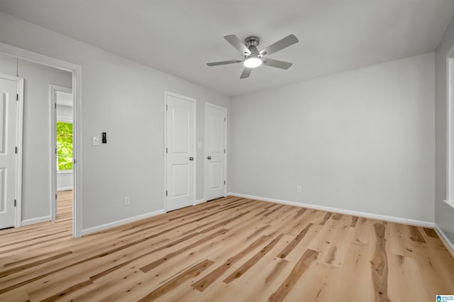 941 Honeysuckle Ln, Moody, AL 35094 - unfurnished bedroom with baseboards, light wood-style flooring, and ceiling fan