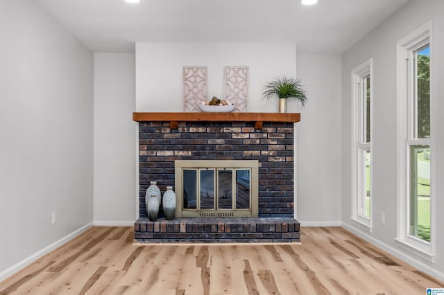 941 Honeysuckle Ln, Moody, AL 35094 - detailed view of a fireplace, wood finished floors, baseboards, and recessed lighting