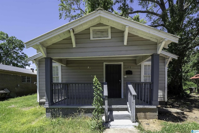 1228 19th Pl SW, Birmingham, AL 35211 - shotgun-style home with a porch