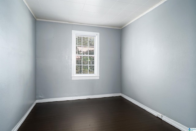 1228 19th Pl SW, Birmingham, AL 35211 - unfurnished room with crown molding, dark wood-style floors, and baseboards