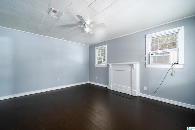 1228 19th Pl SW, Birmingham, AL 35211 - spare room with a ceiling fan, baseboards, dark wood-style floors, and cooling unit