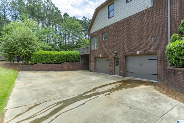 1020 Dunsmore Dr, Chelsea, AL 35043 - view of property exterior with brick siding, driveway, and an attached garage