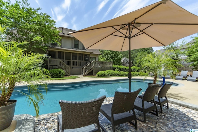 1020 Dunsmore Dr, Chelsea, AL 35043 - swimming pool with a sunroom, stairway, a wooden deck, and a patio area