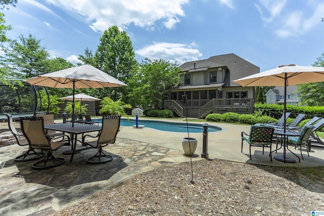 1020 Dunsmore Dr, Chelsea, AL 35043 - swimming pool with a sunroom, stairs, a patio area, a deck, and outdoor dining area