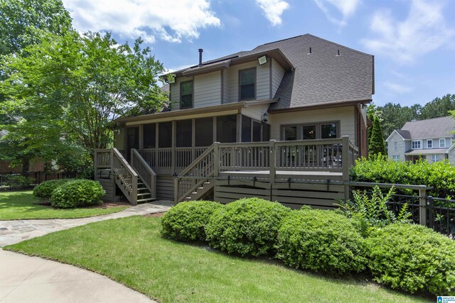 1020 Dunsmore Dr, Chelsea, AL 35043 - view of front facade with a sunroom, stairway, a deck, and roof with shingles
