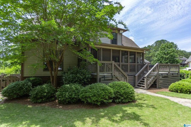 1020 Dunsmore Dr, Chelsea, AL 35043 - back of property featuring a sunroom, stairs, and a wooden deck