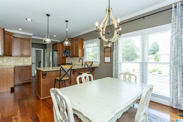 1020 Dunsmore Dr, Chelsea, AL 35043 - dining area with a chandelier, dark wood-type flooring, crown molding, and recessed lighting