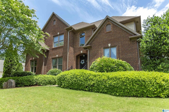 1020 Dunsmore Dr, Chelsea, AL 35043 - traditional-style home with brick siding and a front yard