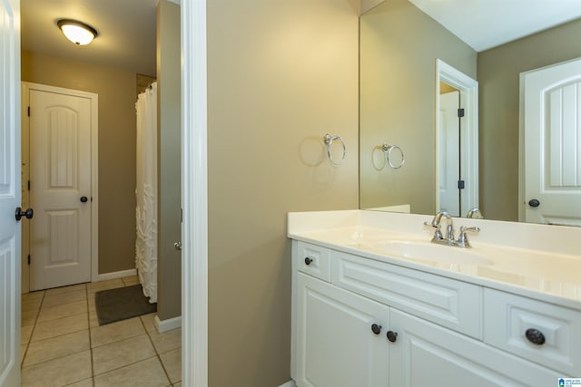 1020 Dunsmore Dr, Chelsea, AL 35043 - bathroom featuring vanity, tile patterned flooring, baseboards, and a shower with curtain