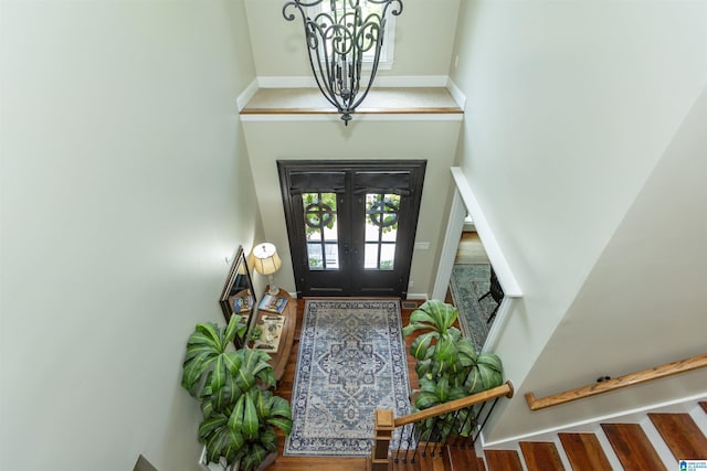 1020 Dunsmore Dr, Chelsea, AL 35043 - foyer featuring a high ceiling, a chandelier, and stairs