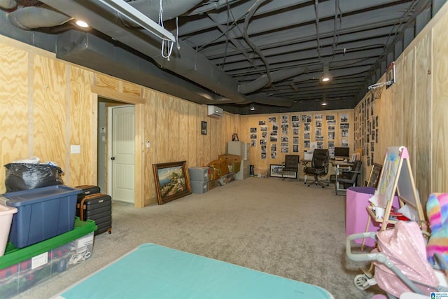 1020 Dunsmore Dr, Chelsea, AL 35043 - below grade area with carpet flooring, an AC wall unit, wood walls, and a desk