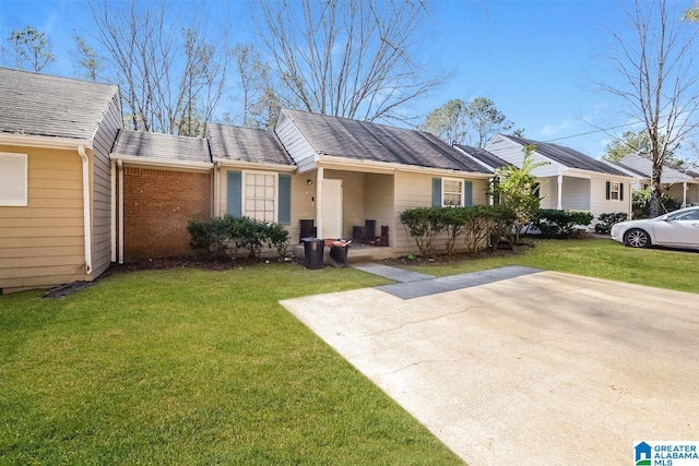 421 Valley Crest Dr, Birmingham, AL 35215 - view of front of house with a front yard and brick siding