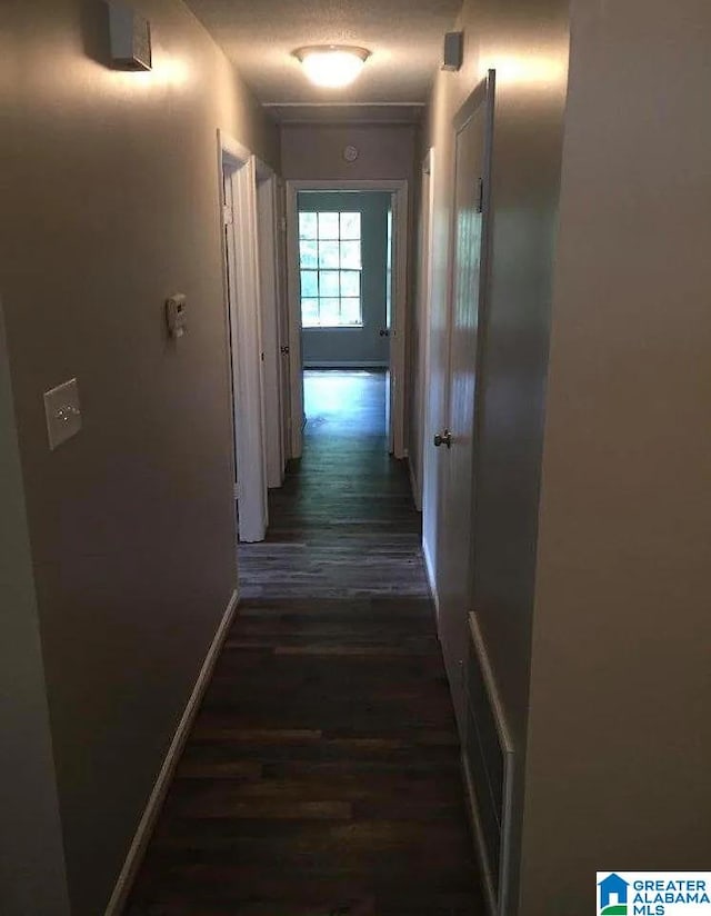 421 Valley Crest Dr, Birmingham, AL 35215 - hall featuring dark wood-style flooring and baseboards