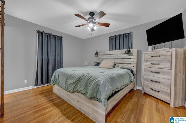 1115 Park Ave, Oneonta, AL 35121 - bedroom with baseboards, light wood-type flooring, and a ceiling fan
