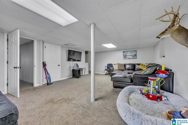 1115 Park Ave, Oneonta, AL 35121 - carpeted living area featuring a paneled ceiling and baseboards
