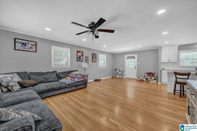 1115 Park Ave, Oneonta, AL 35121 - living area featuring ornamental molding, light wood-style floors, recessed lighting, ceiling fan, and baseboards