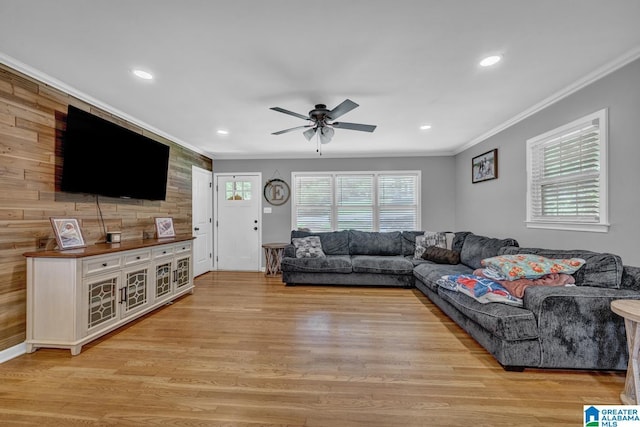 1115 Park Ave, Oneonta, AL 35121 - living room featuring a ceiling fan, ornamental molding, light wood finished floors, recessed lighting, and wood walls