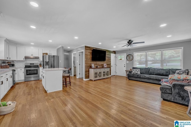 1115 Park Ave, Oneonta, AL 35121 - living room with ceiling fan, light wood-style flooring, ornamental molding, and recessed lighting