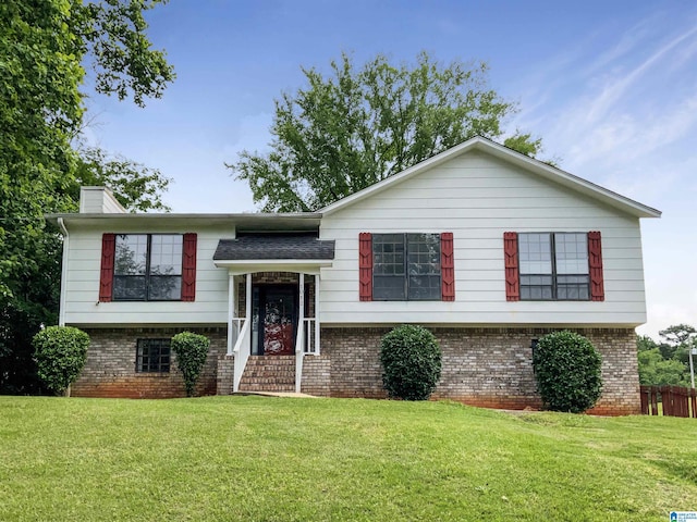 1012 Christopher Dr, Birmingham, AL 35215 - raised ranch with brick siding and a chimney