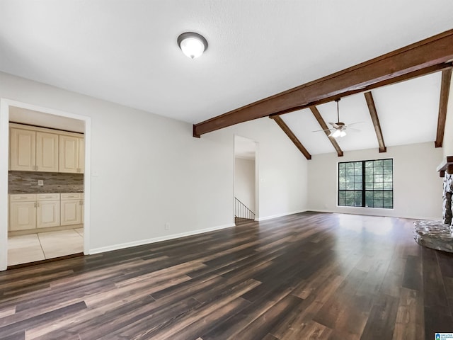 1012 Christopher Dr, Birmingham, AL 35215 - unfurnished living room featuring ceiling fan, wood finished floors, and baseboards