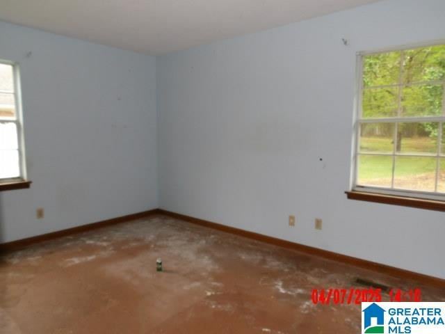 8421 Azalea Dr, Pinson, AL 35126 - unfurnished room with healthy amount of natural light and baseboards