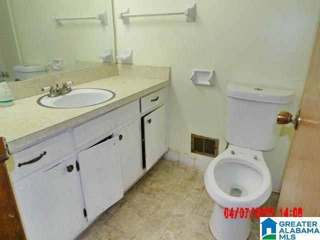 8421 Azalea Dr, Pinson, AL 35126 - bathroom with vanity and toilet