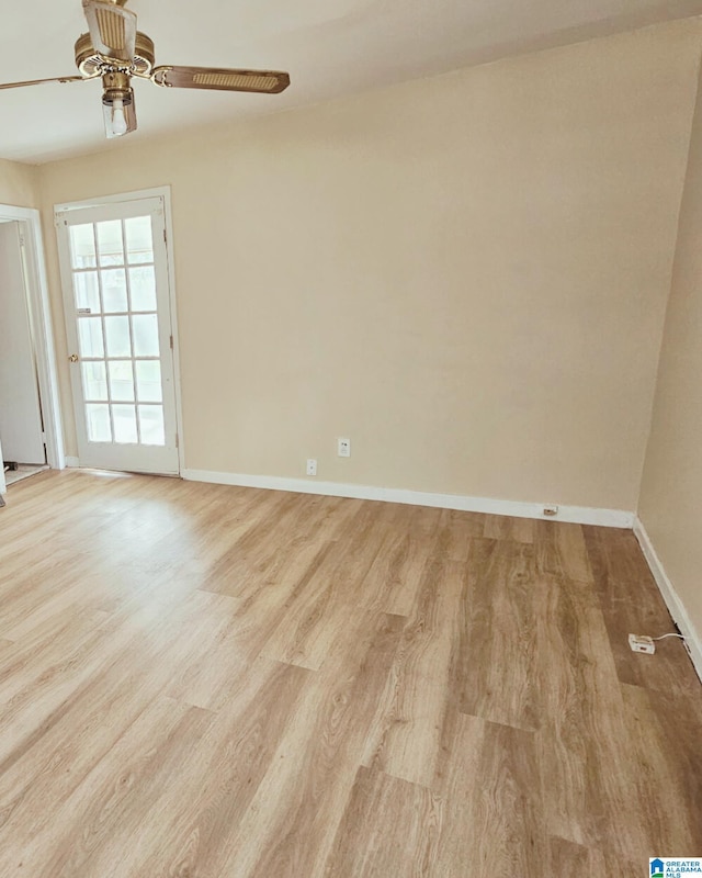 1332 4th Way NW, Center Point, AL 35215 - empty room with wood finished floors, baseboards, and a ceiling fan