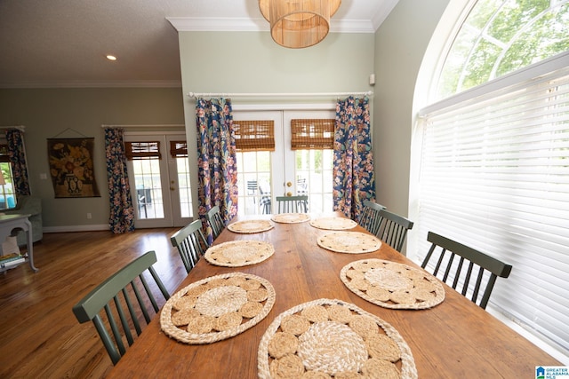 967 Wright Way Dr, Wedowee, AL 36278 - dining space featuring french doors, crown molding, healthy amount of natural light, and wood finished floors