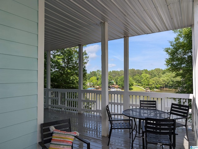 967 Wright Way Dr, Wedowee, AL 36278 - deck with outdoor dining area, view of wooded area, and a water view