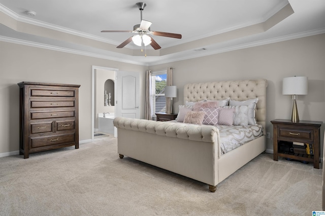 6303 Letson Farms Dr, Bessemer, AL 35022 - bedroom featuring a tray ceiling, ornamental molding, light carpet, connected bathroom, and baseboards
