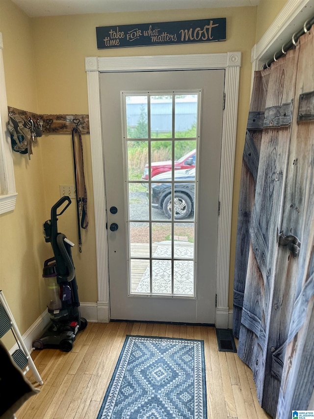 12325 US Highway 411 N, Centre, AL 35960 - doorway to outside featuring wood-type flooring and baseboards