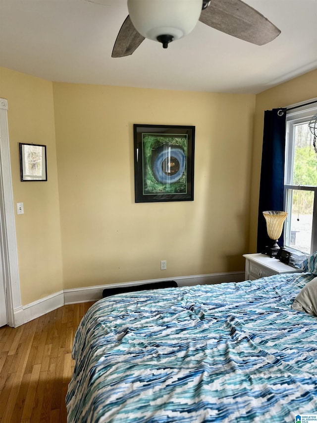 12325 US Highway 411 N, Centre, AL 35960 - bedroom featuring wood finished floors, baseboards, and a ceiling fan
