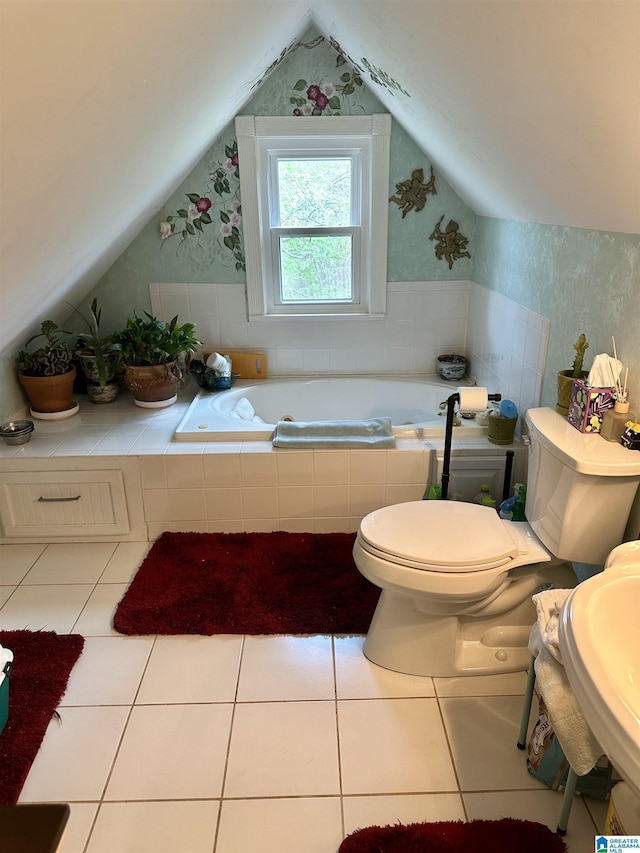 12325 US Highway 411 N, Centre, AL 35960 - bathroom with a bath, toilet, lofted ceiling, wallpapered walls, and tile patterned floors