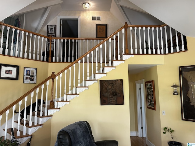 12325 US Highway 411 N, Centre, AL 35960 - staircase featuring high vaulted ceiling and baseboards