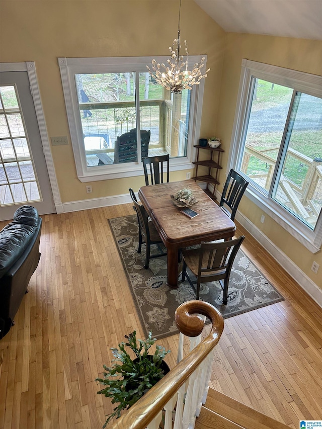 12325 US Highway 411 N, Centre, AL 35960 - dining space with a chandelier, light wood finished floors, baseboards, and vaulted ceiling