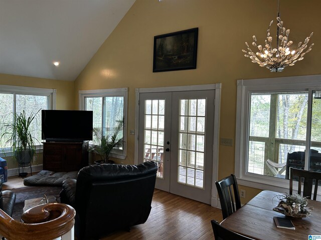 12325 US Highway 411 N, Centre, AL 35960 - living room featuring high vaulted ceiling, a chandelier, french doors, and wood finished floors