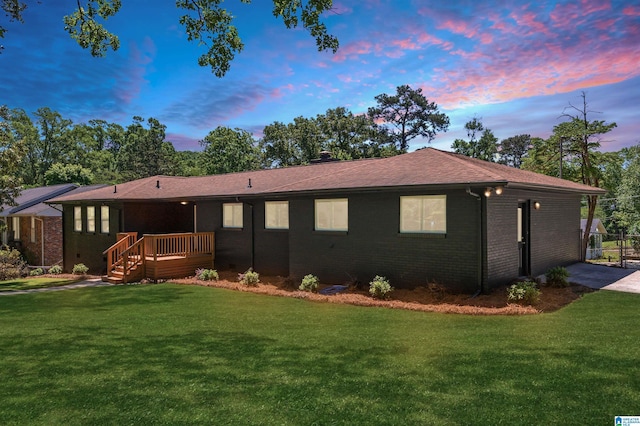732 Highland Ave, Birmingham, AL 35206 - view of front of property with brick siding and a front lawn