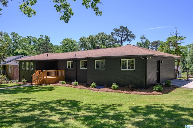 732 Highland Ave, Birmingham, AL 35206 - view of front facade featuring brick siding and a front lawn