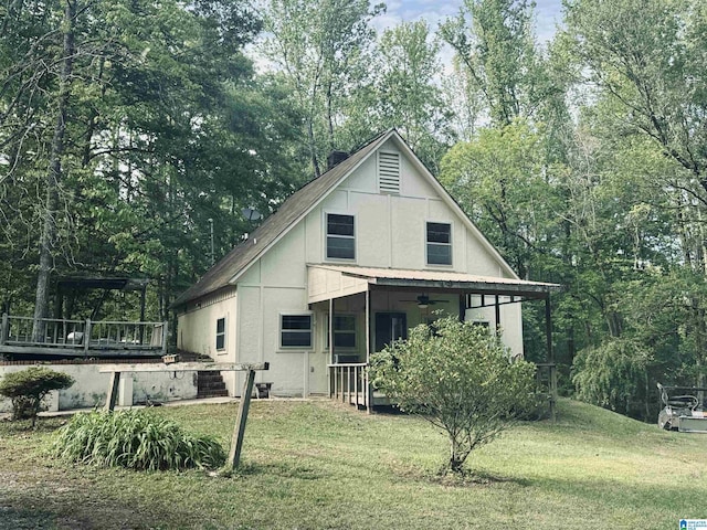 1790 Mount View Rd, Wellington, AL 36279 - back of house with ceiling fan, a lawn, a porch, and stucco siding