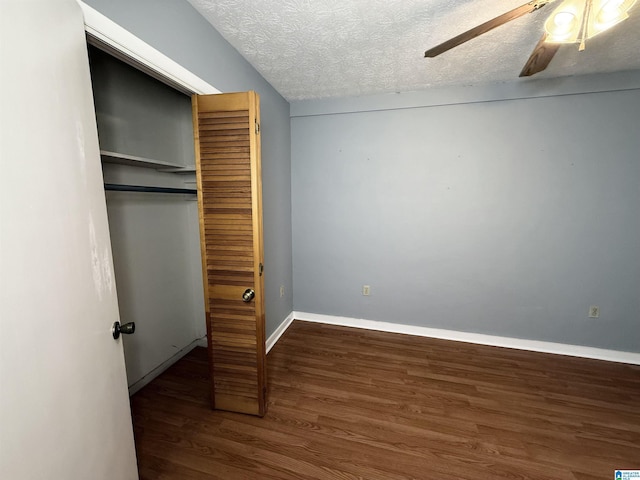 1790 Mount View Rd, Wellington, AL 36279 - unfurnished bedroom with wood finished floors, a textured ceiling, a ceiling fan, baseboards, and a closet