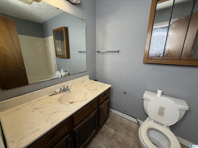 1790 Mount View Rd, Wellington, AL 36279 - full bath with vanity, toilet, tile patterned flooring, baseboards, and shower / bathtub combination
